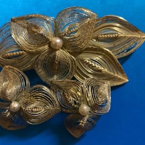 pin set is made of wire.one is really old. I have kept it in tissues